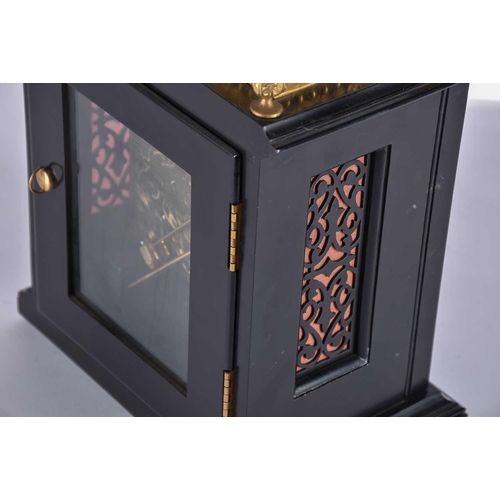 443 - An F W Elliott Golden Jubilee bracket clock, the ebonised case with gilt metal mounts, chiming on th... 