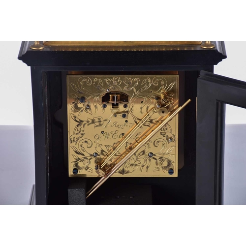 443 - An F W Elliott Golden Jubilee bracket clock, the ebonised case with gilt metal mounts, chiming on th... 