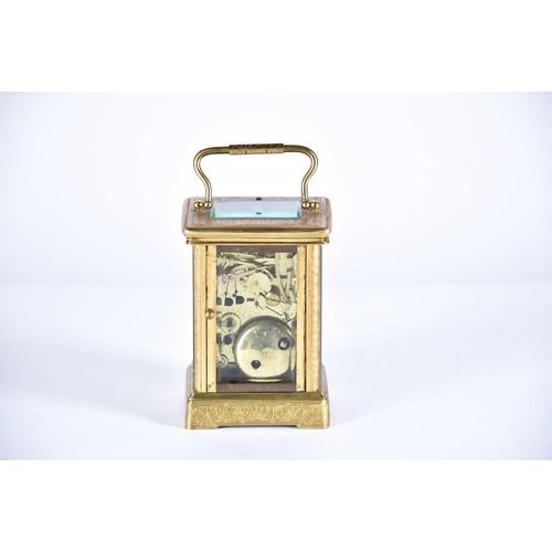 445 - A large brass cased carriage clock, late 19th century, the enamel dial with roman numerals and subsi... 