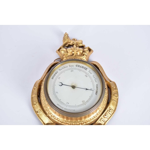 446 - A 20th-century combination gilt wall clock aneroid barometer, thermometer in an armorial gilt cast i... 