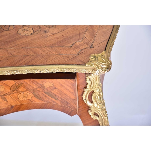 450 - A Louis XVI style floral marquetry and Kingwood and tulip wood side table with cartouch shaped top a... 