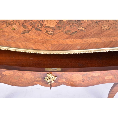 450 - A Louis XVI style floral marquetry and Kingwood and tulip wood side table with cartouch shaped top a... 