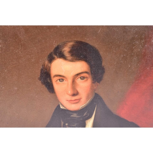 46 - Attributed to Stephen Pearce (1819-1904), a portrait of a gentleman in a black frock coat, oil on pa... 