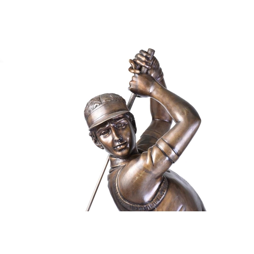 460 - A contemporary life-size cast bronze figure of a gentleman golfer in full swing on a naturalistic ba... 