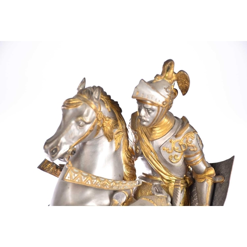 471 - A pair of parcel gilt and silvered metal equestrian warrior figures, 20th century, modelled as a med... 