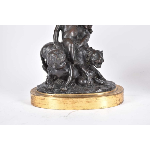 478 - 19th century French school, a pair of Bacchanalian bronze table lamps, modeled seated upon a goat an... 