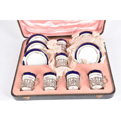 482 - An early 20th Century set of six Copeland Spode coffee cans and saucers with hallmarked silver holde... 