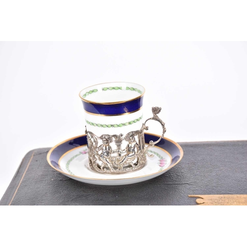 482 - An early 20th Century set of six Copeland Spode coffee cans and saucers with hallmarked silver holde... 