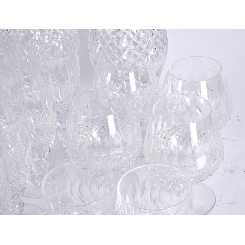 486 - A suite of seventy Waterford Crystal Colleen pattern drinking glasses and a pair of decanters, for e... 