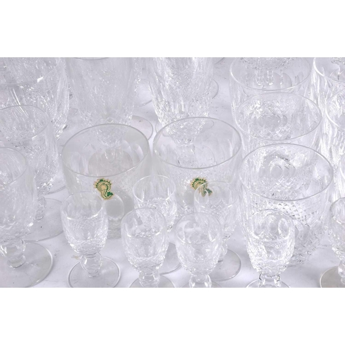 486 - A suite of seventy Waterford Crystal Colleen pattern drinking glasses and a pair of decanters, for e... 