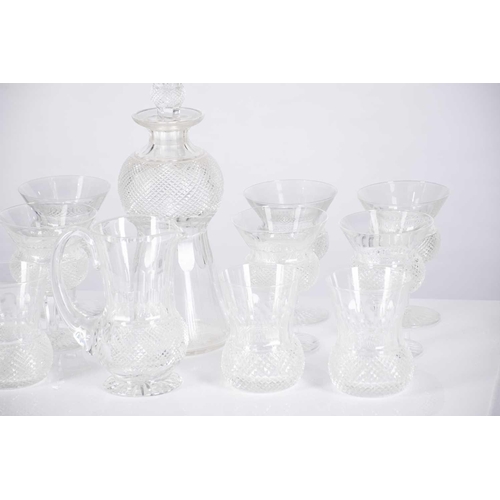 489 - A subststantial part suite of 49 items of cut glass including a bell shaped decanter and a small wat... 