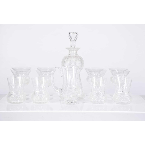 489 - A subststantial part suite of 49 items of cut glass including a bell shaped decanter and a small wat... 