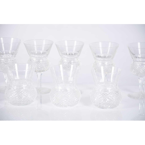 489 - A subststantial part suite of 49 items of cut glass including a bell shaped decanter and a small wat... 