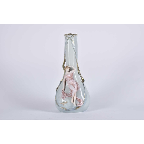 492 - An early 20th century Bohemian ceramic Art Nouveau vase with figure and mask. Dimensions, height 36 ... 