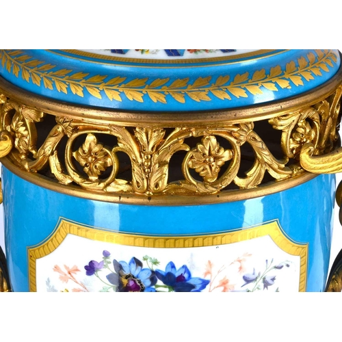 494 - A large pair of Sevres ormolu mounted pedestal vases and covers, 19th century, the compressed bell s... 