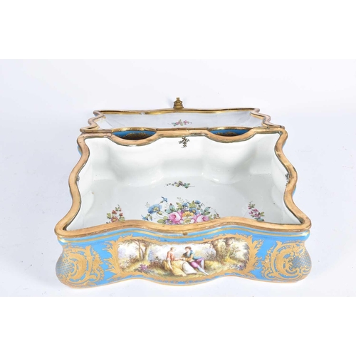 500 - A large Sevres style porcelain bombe casket, late 19th century, painted with Watteau inspired panels... 