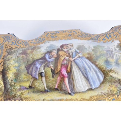 500 - A large Sevres style porcelain bombe casket, late 19th century, painted with Watteau inspired panels... 