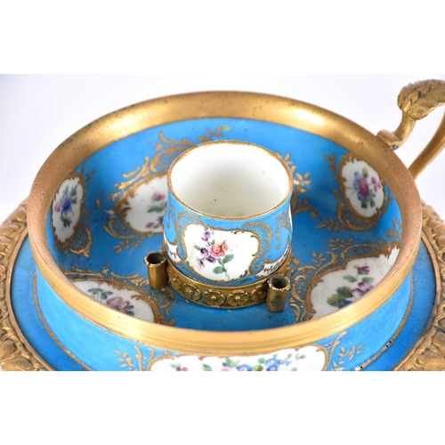 502 - A Sevres style porcelain and gilt metal mounted inkwell,19th century, the central bulb shaped cup wi... 