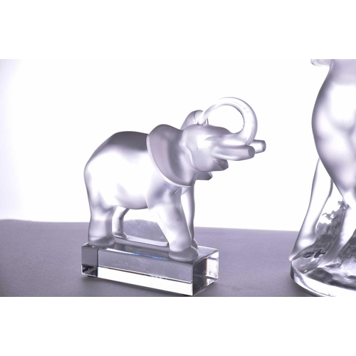 503 - Four items of contemporary Lalique glassware, consisting of an elephant paperweight, max height 15.5... 