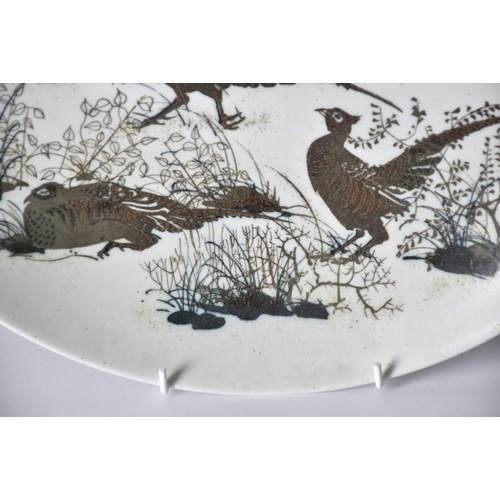 506 - A large Royal Copenhagen No 1066-5371 aluminia faience charger decorated with pheasants, by Nils Tho... 