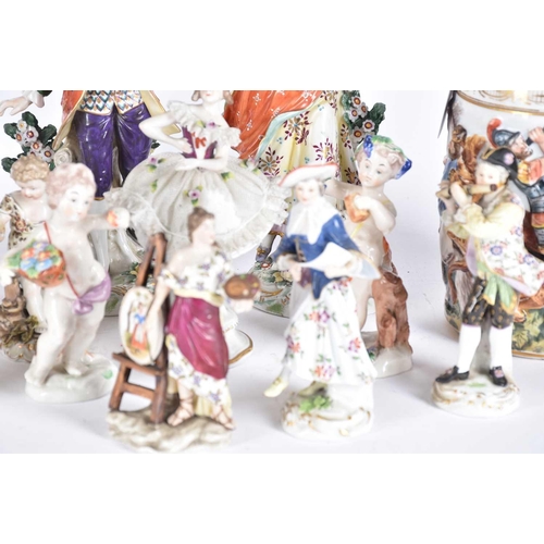 511 - A collection of Continental porcelain figures, late 19th/early 20th century, two Meissen figures of ... 