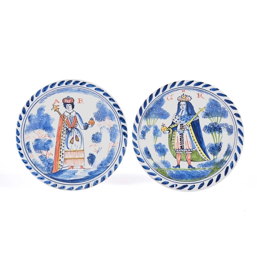 513 - A 19th-century circular French faience blue and white dish with ochre dressed rim 35 cm together wit... 