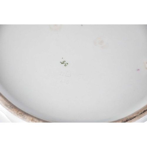 514 - A pair of large 19th Century Austrian porcelain dishes/chargers with Beehive mark to reverse, hand-p... 