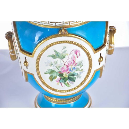 517 - A Sevres style panel set into a gilt metal dish, 19th century, painted with a floral spray on a blue... 