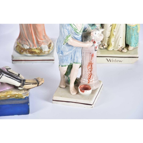 518 - A collection of early 19th century Staffordshire pearlware figures, including an Enoch Wood figure o... 