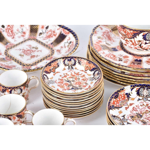 526 - A collection of Royal Crown Derby Imari, comprising a part tea and coffee service, pattern 383, circ... 