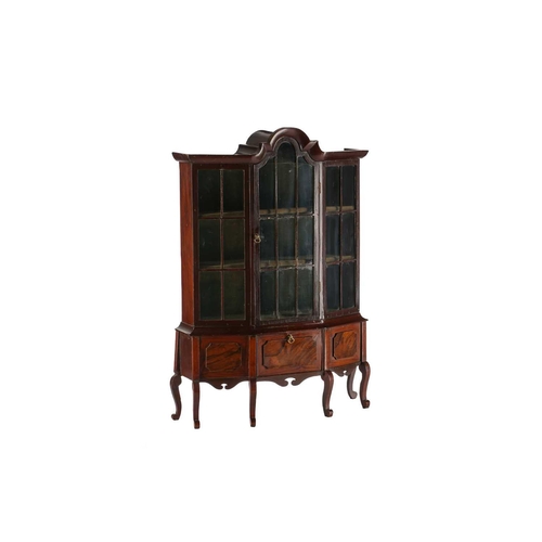 532 - An 18th-century style walnut miniature library bookcase with arched cornicing above a single central... 