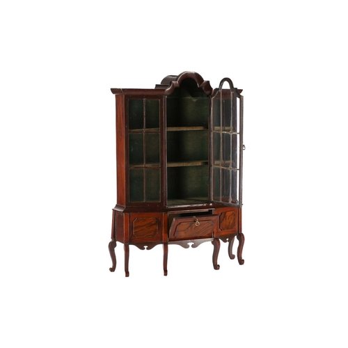 532 - An 18th-century style walnut miniature library bookcase with arched cornicing above a single central... 