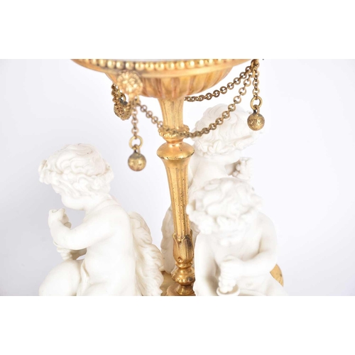 534 - A pair of gilt metal and moulded glass bonbon dishes, the part frosted dished glass with Greek key d... 