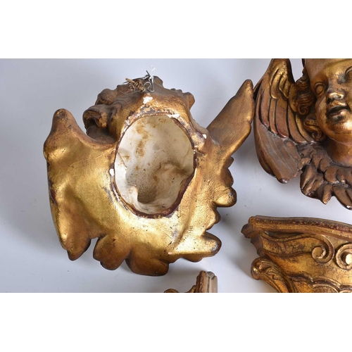 538 - A pair of gilt plaster cherub wall plaques plus a pair of Italian Neoclassical style giltwood walls ... 