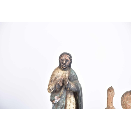 540 - An 18th-century Limewood figure of a Saint with traces of polychromic paint 19 cm high together with... 