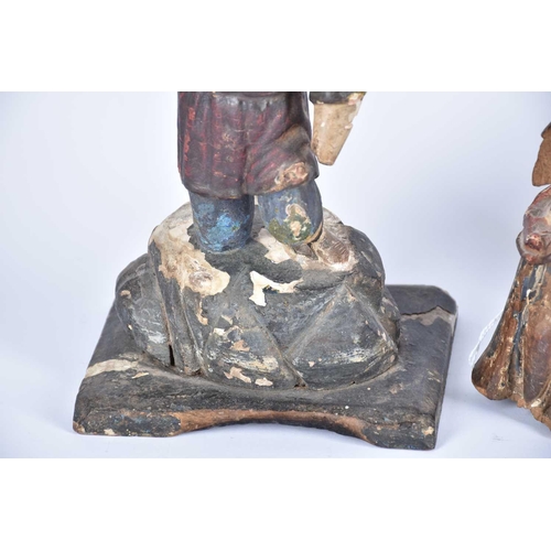 540 - An 18th-century Limewood figure of a Saint with traces of polychromic paint 19 cm high together with... 