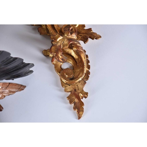 541 - A pair of 20th Century carved wood wall sconces in the form of cherubs, a rococo style giltwood wall... 