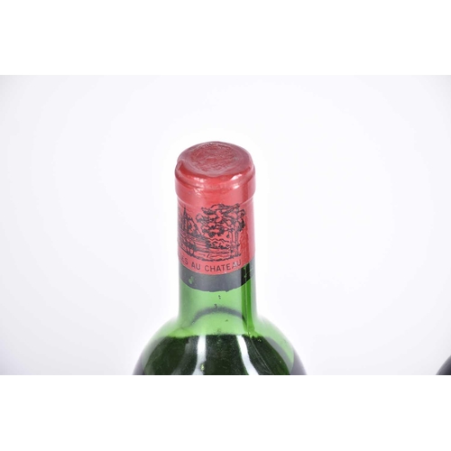 556 - A bottle of Chateau Lafite Rothschild, 1971, level at mid-shoulder, capsule good, together with a 19... 