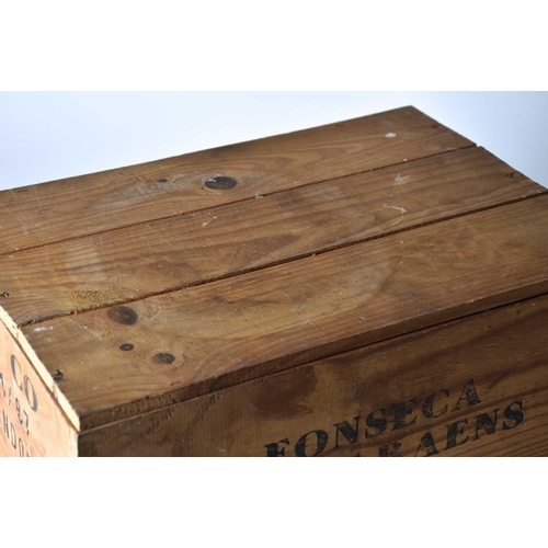 557 - Fonseca Guimaraens 1972 Vintage Port, an unopened wood case of 12 bottlesA private Bedfordshire coll... 