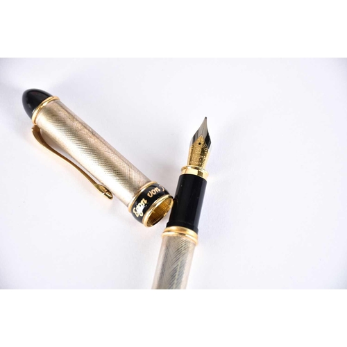 561 - A Regali Regali sterling silver fountain pen designed by Egon von Furstenberg, with black lacquer an... 