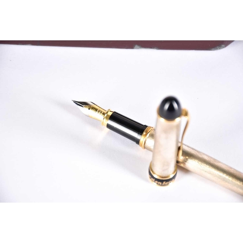 561 - A Regali Regali sterling silver fountain pen designed by Egon von Furstenberg, with black lacquer an... 