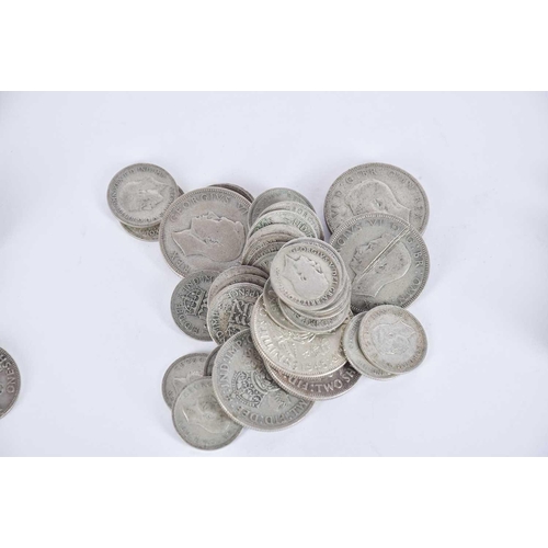 563 - A collection of pre 1947 silver content coins, comprising 6 x two shillings, 104 x shillings and 31 ... 