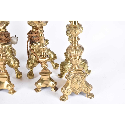 571 - Four pairs of rococo style Dutch brass pricket stands, candlesticks and table lights, 20th century, ... 