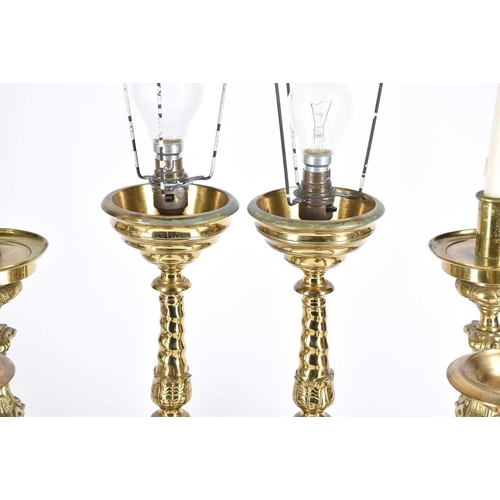 571 - Four pairs of rococo style Dutch brass pricket stands, candlesticks and table lights, 20th century, ... 