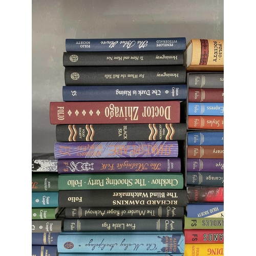 579 - A quantity of Folio Society books, to include Agatha Christie, Ian Fleming, John Buchan and others, ... 