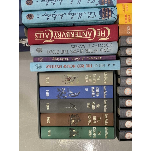 579 - A quantity of Folio Society books, to include Agatha Christie, Ian Fleming, John Buchan and others, ... 