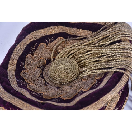 580 - A Victorian gold thread emdroidered smoking hat, with gilt thread tassel, and vintage brown leather ... 