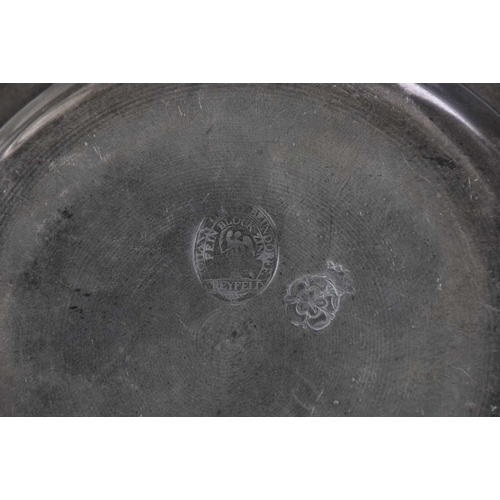 581 - A collection of 18th & 19th century pewter dishes, to include a large platter with touchmarks of Sty... 