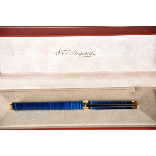 583 - An S T Dupont blue banded Laque de Chine fountain pen, with 18ct gold nib, serial number 44CCA95; an... 