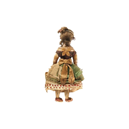 593 - A 19th century poured wax headed doll with inset glass eyes and real hair waxen fabric body limbs, i... 